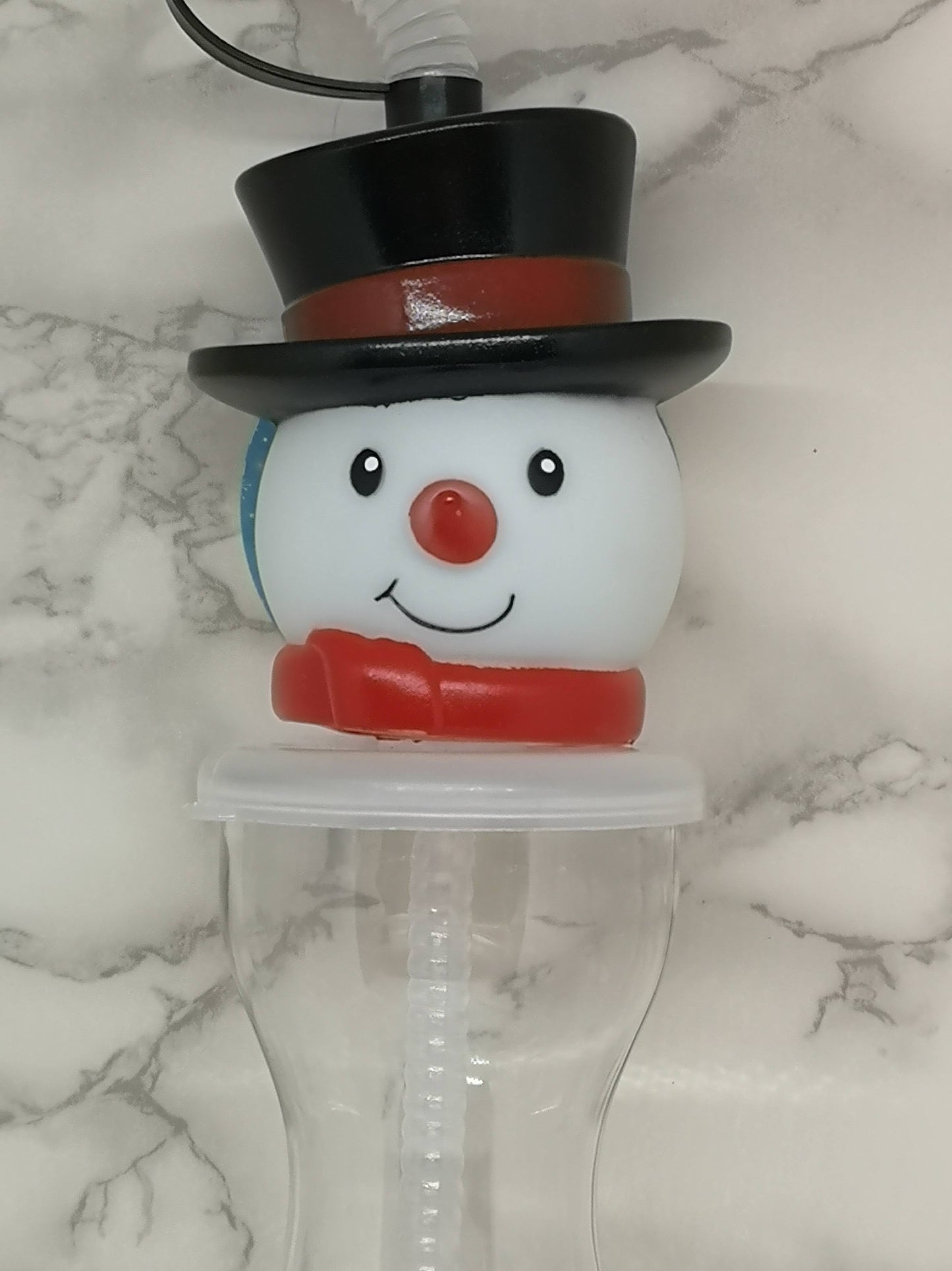 Snowman drinks bottle