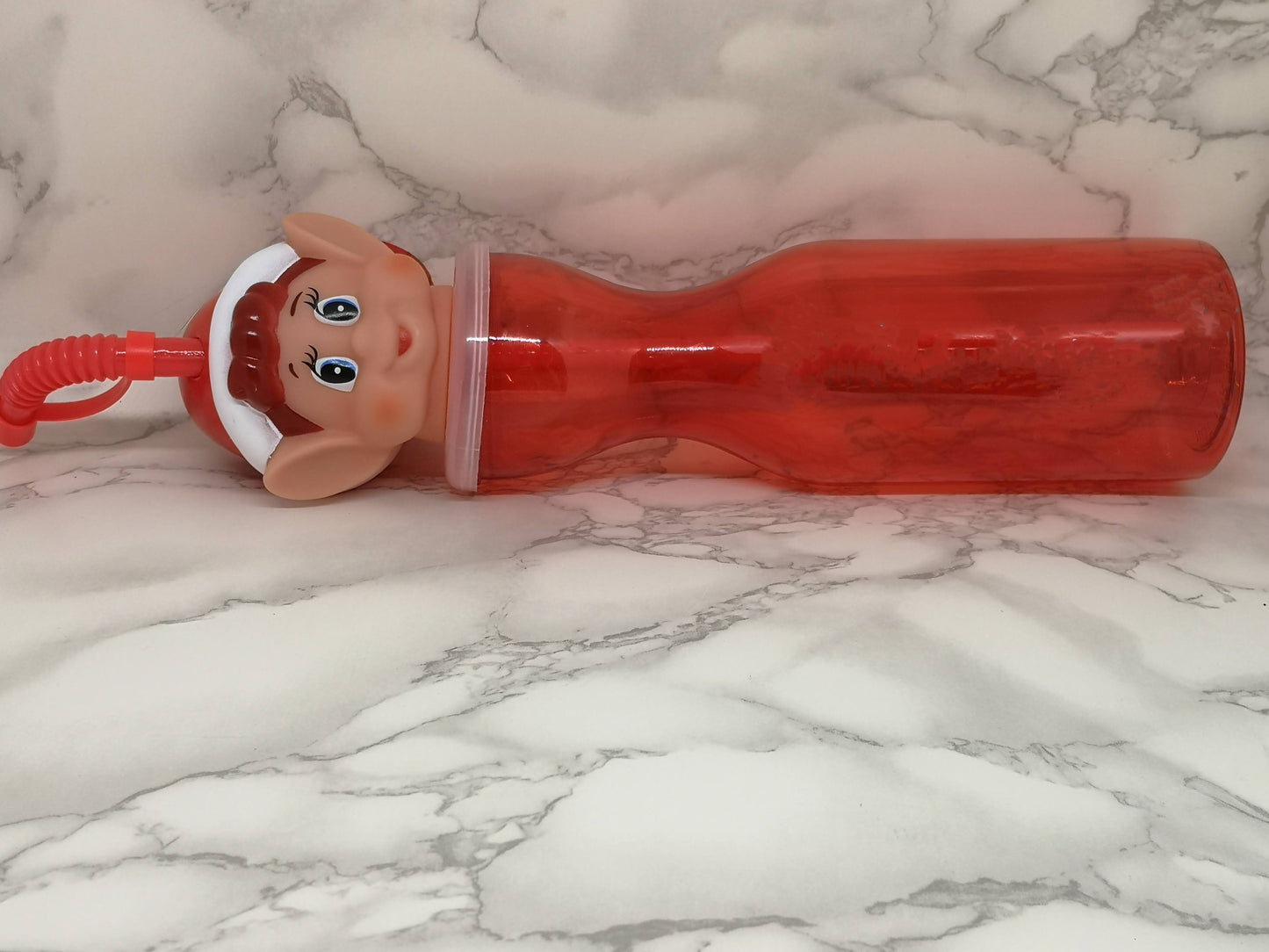 Elf drinks bottle